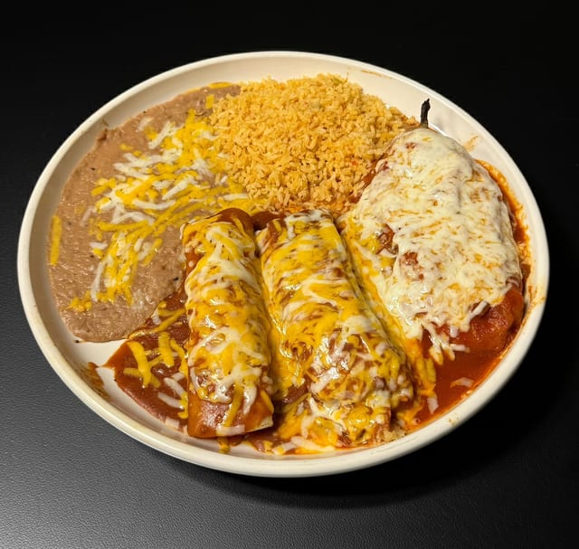 # 23 Enchilada, Tamale (Pork) and Chile Relleno (Cheese).