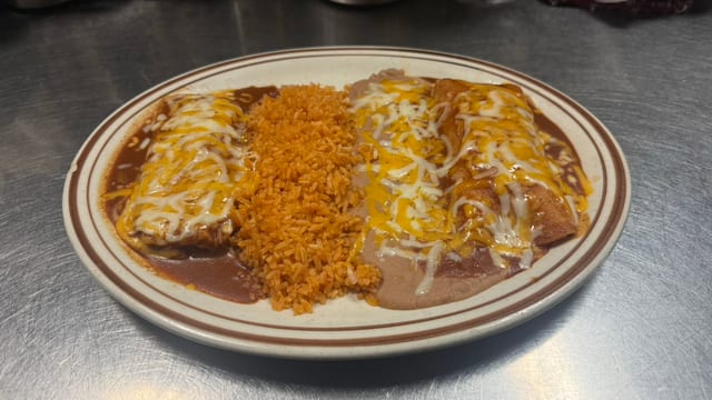 # 16 1 Enchilada and 1 Tamal (Pork).